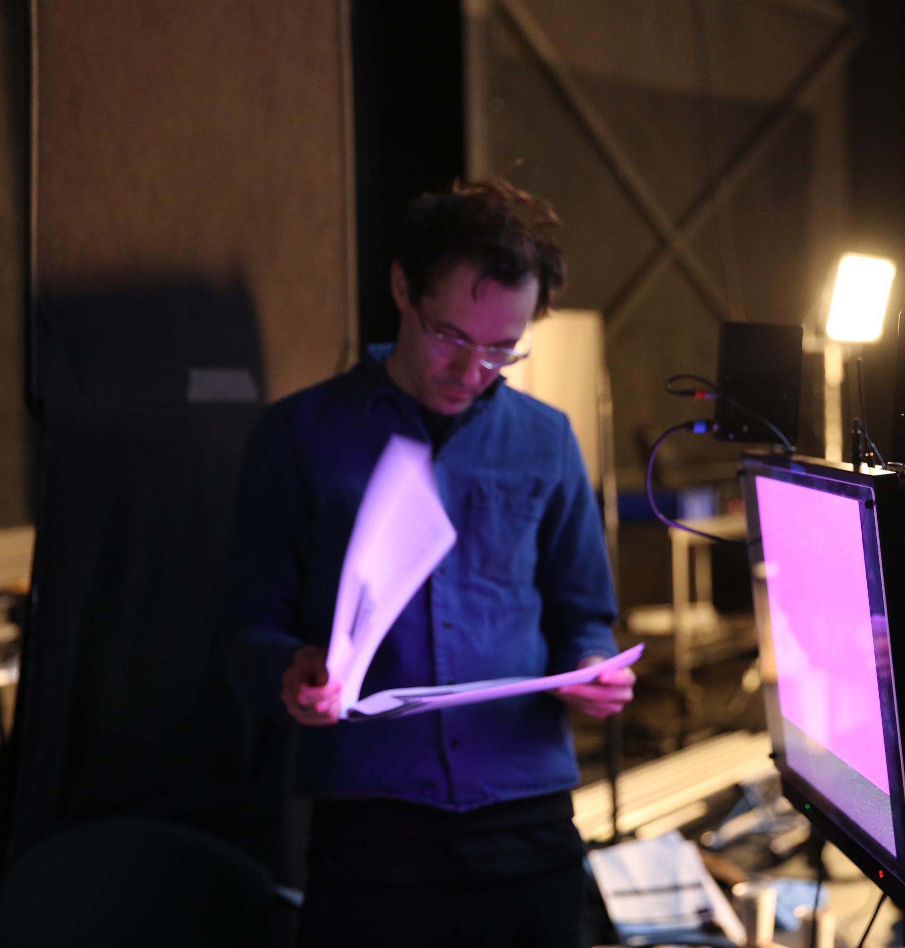 Emile Rafael reviewing work in the studio